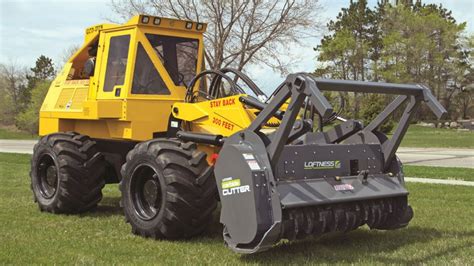 tractor attachment for clearing brush